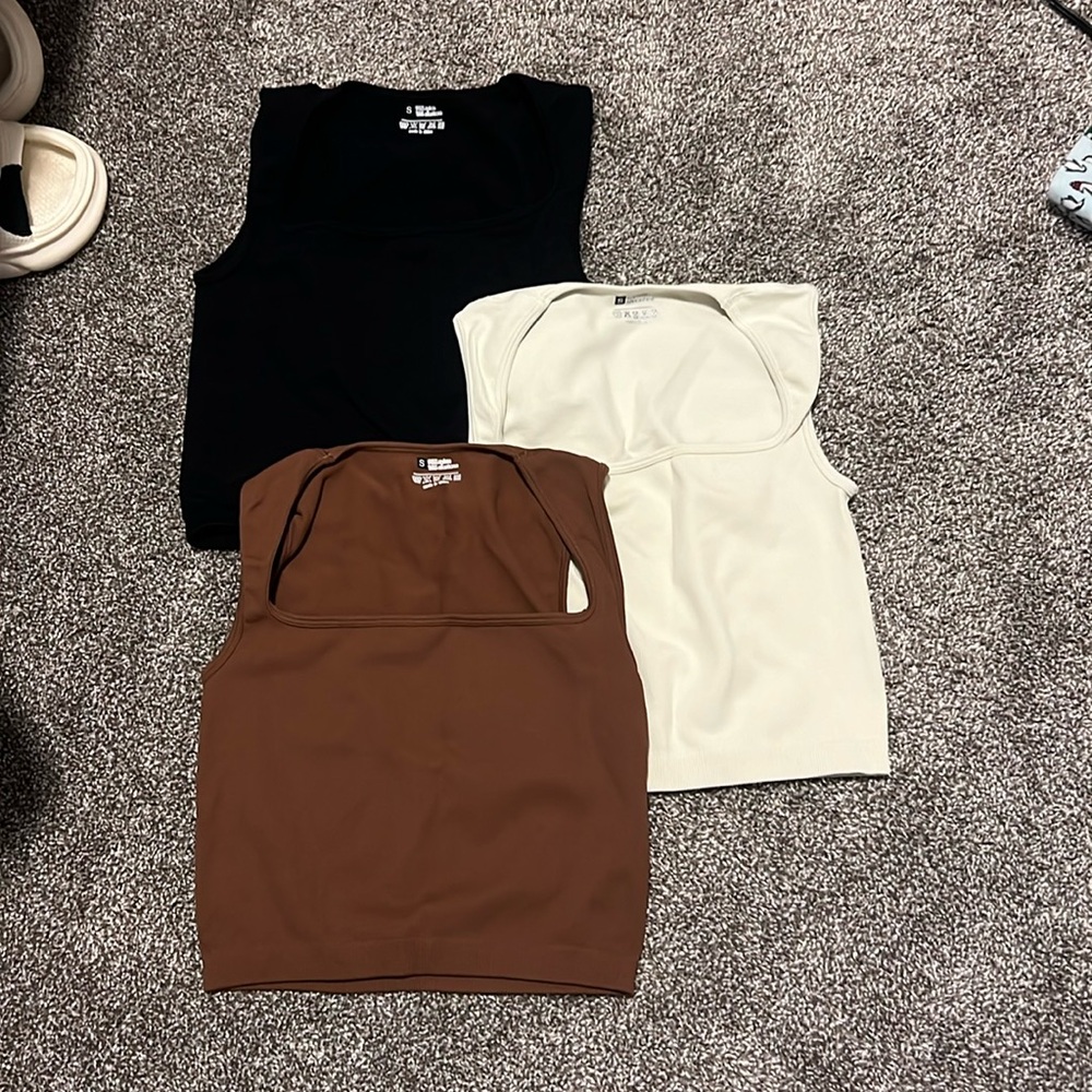 Three cropped tank tops